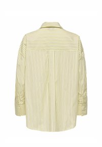 Chemise jaune à manches longues avec fines rayures noires verticales et rayures horizontales sur le haut du dos et les poignets, vue de dos.