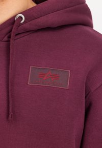 Alpha Industries Kapuzenpullover - dark cherry