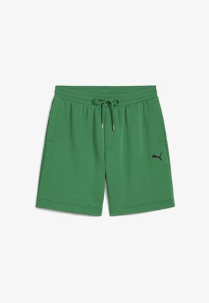 Shorts en coton verts avec une taille élastique et un cordon de serrage ajustable. Comprend deux poches latérales et un logo Puma noir sur la jambe gauche.