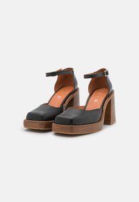Chio Saltos altos - black buttero