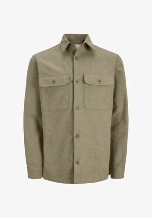 Olive green button-up shirt made of textured fabric with two chest pockets, visible buttons, and a classic collar design.
