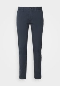 Chinos blu navy in cotone, con design a gamba dritta, chiusura a bottoni e tasche standard. Texture liscia senza fantasie.