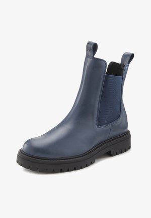 Navy leather ankle boot with elastic side panels, round toe, and a rugged black outsole. Features pull tabs for easy wear.