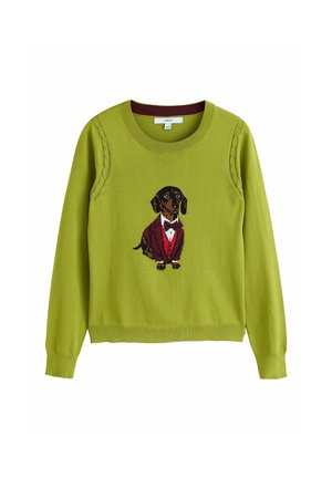 Grøn langærmet sweater med en sort og brun gravhund iført rød smoking og butterfly strikket på fronten.