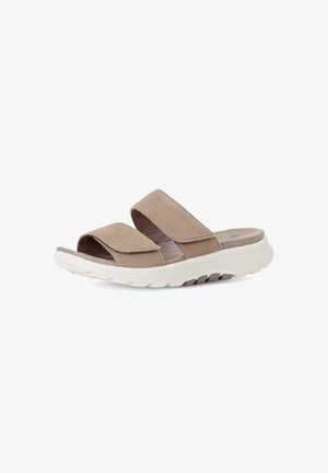 Beige suède open-toe slidesandaal met twee verstelbare bandjes en dikke witte gestructureerde zool, geschikt voor casual gebruik.