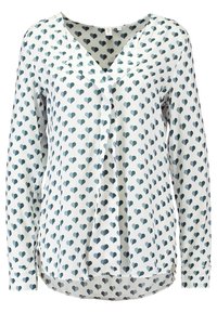 Long-sleeve blouse in light fabric features a white background with small blue heart patterns, V-neckline, and curved hemline.