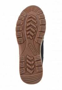 Kumipohjan pinta, jossa on teksturoitu, kuvioitu kangas, joka tarjoaa pitoa. Ominaisuuksina ruskean ja beigen värin sekoitus, mikä korostaa kestävyyttä ja pitoa.