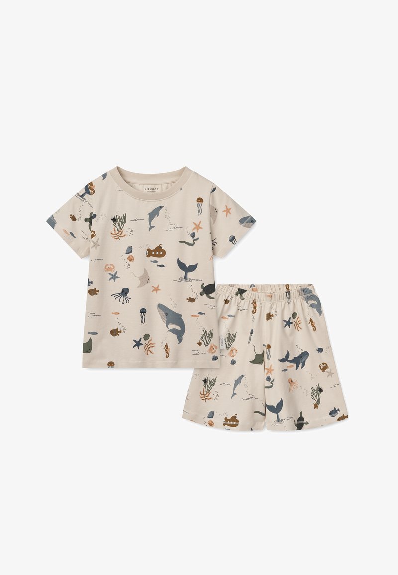 Ανοιχτό μπεζ βαμβακερό σετ δύο κομματιών, που περιλαμβάνει πουκάμισο με κοντό μανίκι και σορτσάκια με ελαστική μέση, διακοσμημένο με μοτίβα θαλάσσιων πλασμάτων σε διάφορα χρώματα.