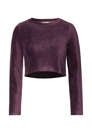 Langsleeve cropped top in donkerpaars fluweel met een ronde halslijn en een zachte textuur. Heeft aangesloten mouwen en een strakke uitstraling.
