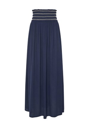 Marineblauwe maxi-rok met geplooide tailleband met witte zigzagpatronen, vloeiend stof en enkellang zoom.