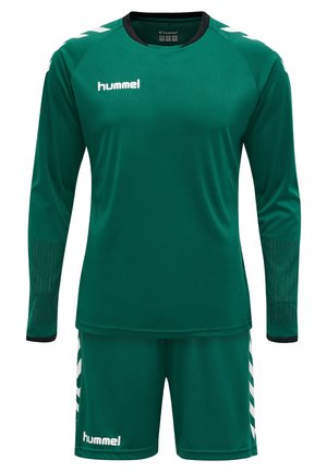 Groen sportuniform met een lang mouwtop met zwarte accenten en mesh-detail, gecombineerd met bijpassende shorts en een wit logo.