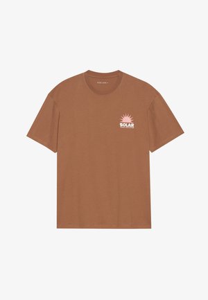 Brown short-sleeve t-shirt made of cotton, featuring a pink sun graphic and "SOLAR" text on the left chest. Crew neck design.