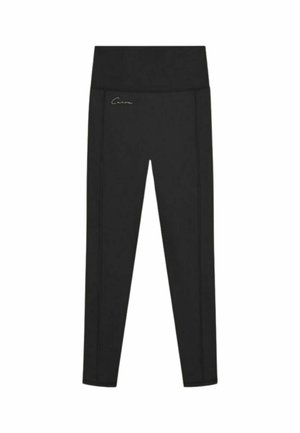 Legging noir taille haute longueur totale avec un petit logo signature sur la zone de la hanche sur fond blanc.