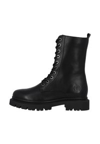 Bottines en cuir noir avec un bout rond, huit passants en métal et une semelle en caoutchouc épaisse dotée d'un motif de bande de roulement texturé.