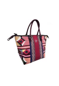 Borsa tote multicolore con motivi geometrici in rosa, blu e marrone. Presenta due manici e una chiusura magnetica per un facile accesso.