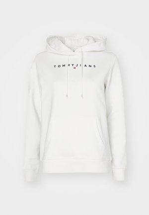 Hvit hettegenser laget av mykt materiale med kengurulomme, snor i hetten og marineblå "TOMMY JEANS"-logo på brystet.