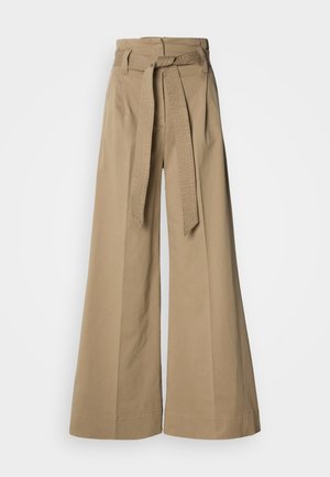 Béžové široké nohavice s vysokým pásom, s pásikom na zaväzovanie a textúrovaným pásom. Vyrobené z bavlny s hladkým povrchom.