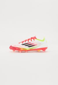 F50 PRO FIRM GROUND - Scarpe da calcio per terreni duri - white/core black/solar yellow