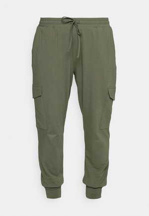 Olive green sweatpants made from soft fabric, featuring an elastic waistband with drawstring, tapered cuffs, and side cargo pockets.