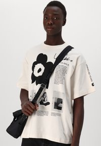 Marimekko NOPEUS UNIKKO UNISEX - T-shirts print - off white