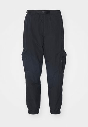 Nike Sportswear TECH WOVEN - Oldalzsebes nadrágok - black