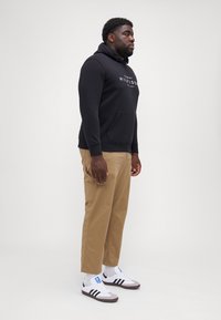 Tommy Hilfiger HOODY - Sudadera - black