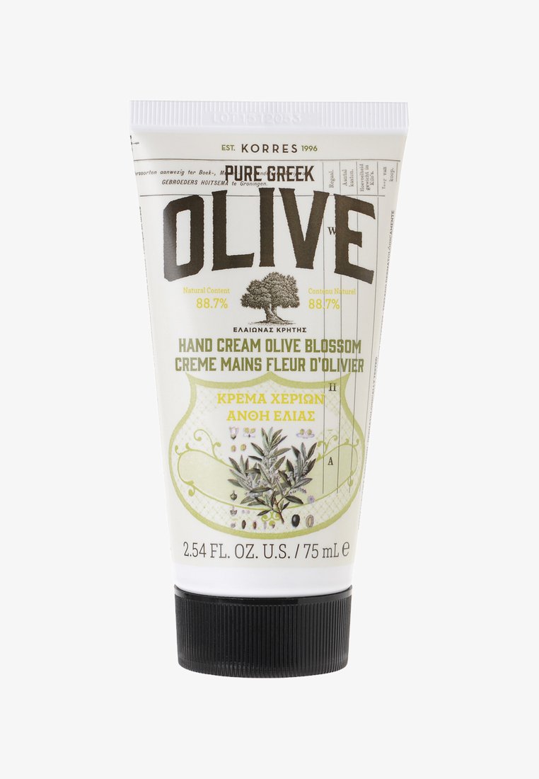 Olivblomma handkräm i en vit tub med gröna accenter, med ett svart flip-top-lock och botaniska illustrationer. Storlek: 75 mL.