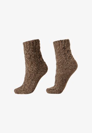 Hnědé pletené ponožky s texturovaným kabelovým vzorem, s žebrovaným lemem a měkkým, pohodlným materiálem pro teplo a komfort.