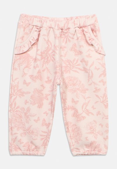 Pantaloni rosa chiaro per bambino piccolo con fascia elastica in vita e alle caviglie, decorati con delicati motivi floreali e farfalle e tasche arricciate.