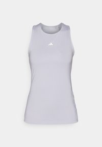 Světle šedý bezrukávový sportovní top vyrobený z hladkého, elastického materiálu. Na hrudi se nachází malé bílé logo.