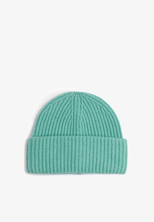Mint green knitted beanie with a ribbed texture, featuring a turned-up cuff and a rounded top. Made from soft, flexible material.