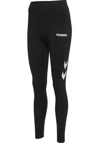 Leggings noirs en tissu extensible avec une taille haute. Présente un logo blanc à l'avant et trois motifs en chevron blancs sur le côté.