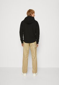 Calvin Klein Jeans ARCHIVAL MONOLOGO HOODIE - Jersey con capucha - ck black