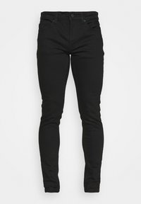 Jeans ajustados negros hechos de una mezcla de algodón. Cuenta con cinco bolsillos, cremallera y herrajes de metal. Textura suave, diseño ceñido.