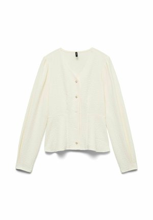 Lys kremfarget cardigan med lange ermer og V-hals, laget av teksturert stoff, med tre knapper foran. Har sidelommer og en avslappet passform.