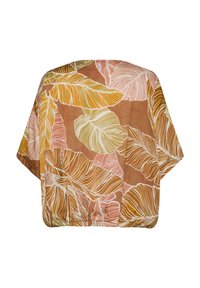 Brun, oversized bluse med et bladmotiv i creme, pink og gul. Har vide ærmer og en afslappet pasform. Glat stoftekstur.