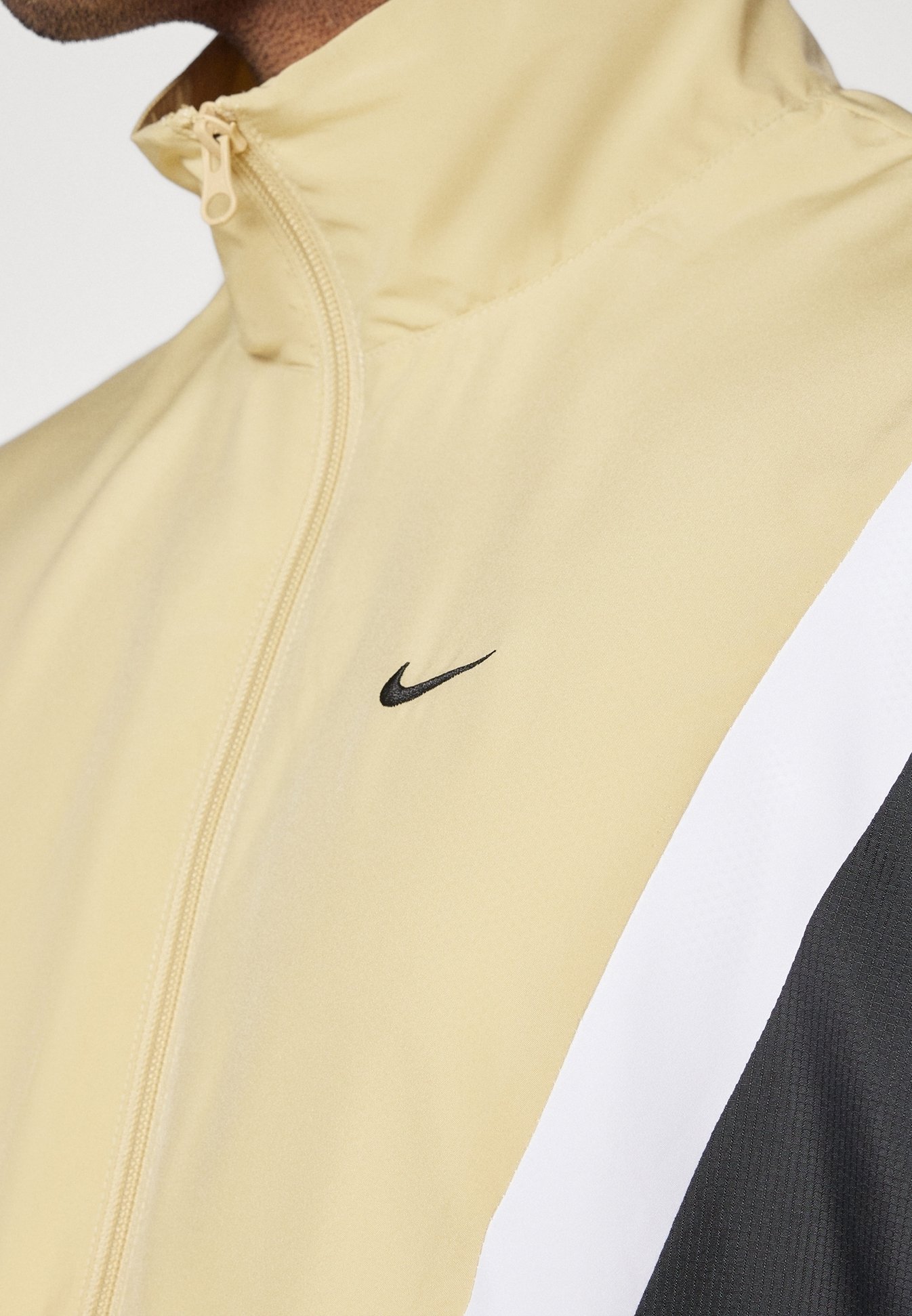 gold windbreaker nike