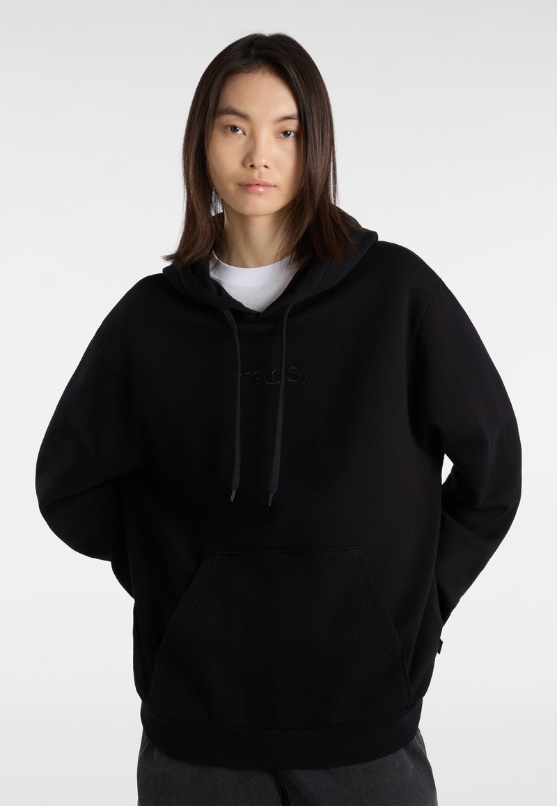 Hoodie surdimensionné noir avec poche kangourou, capuche à cordon de serrage, logo brodé et tissu doux et texturé.