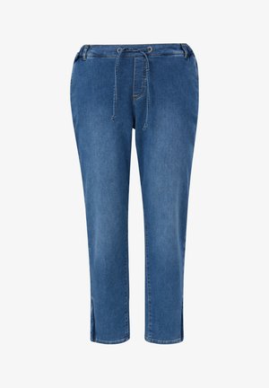 Pantalones de mezclilla azul con cinturilla elástica, corte ajustado, bolsillos laterales y abertura en los puños. Presentan una textura suave y costuras clásicas.