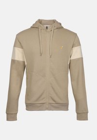 Beige zip-up hoodie met trekkoorden, ribgebreide mouwen, lichtbeige strepen op de bovenarmen en een klein geel vogellogo op de borst.