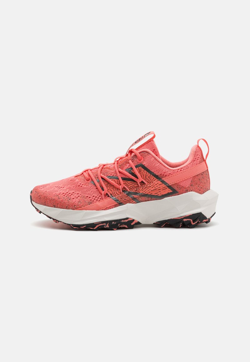 Sport shoe in bright coral mesh upper with reflective black accents, a cushioned white midsole, and textured black outsole with pink details.