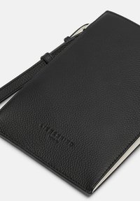 Black leather wallet with a textured finish, featuring a secure closure strap and embossed brand logo. Simple, rectangular design.