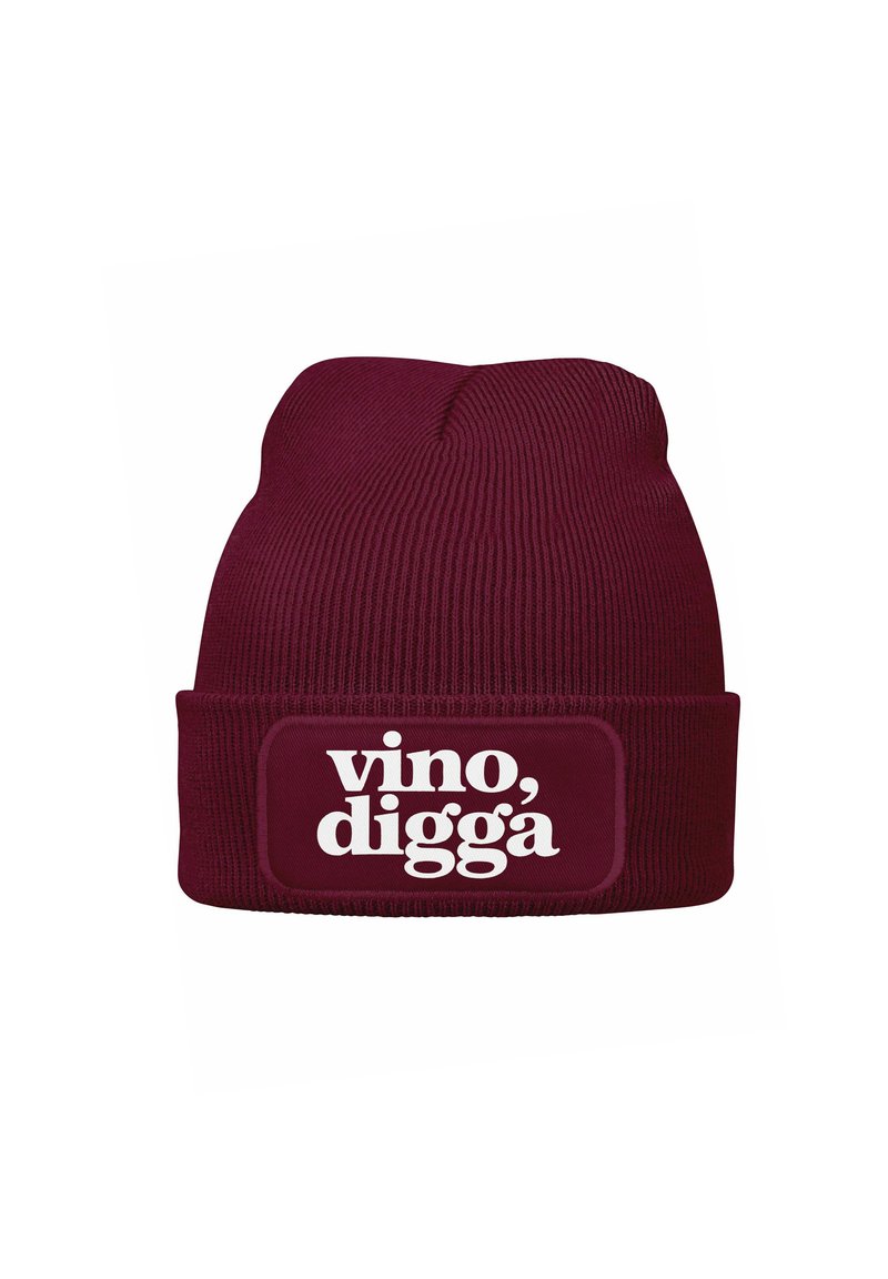 Burgundy knit beanie with folded cuff, featuring a white printed label that reads "vino, digga." Ribbed texture throughout.