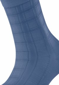 Blaue gestrickte Socken mit einem strukturierten Rippmuster und gerippten Bündchen. Das Material wirkt glatt mit einem subtilen Glanz.