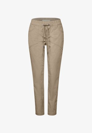Beige, schmal zulaufende Hose aus einem Stoff mit glatter Textur. Verfügt über einen elastischen Bund mit Kordelzug und zwei Vordertaschen.