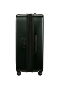 Black hardshell suitcase with a glossy finish, zipper closure, built-in lock, and four wheels for mobility. Features a side handle.