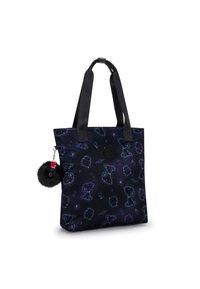 Czarna torba tote z kosmicznym nadrukiem przedstawiającym konstelacje w kolorach niebieskim i fioletowym. Zawiera czarny pompon z futra jako ozdobę. Gładkie wykończenie materiału.