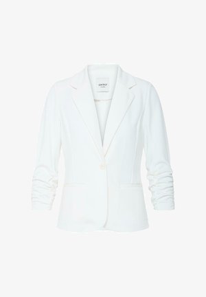 Fehér női szabott blézer fodros ujjakkal, egy elülső gombbal, mély hajtókával és két elülső zsebbel.