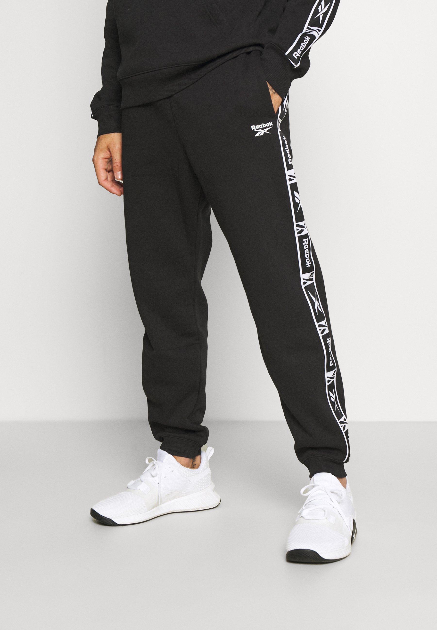 Reebok TAPE - Pantalones deportivos - black/negro 