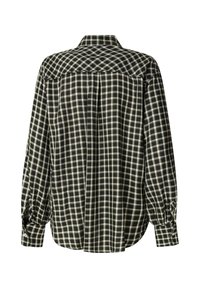 Camicia a quadri in bianco e nero con yoke posteriore, polsini con bottoni e vestibilità rilassata. Il tessuto sembra avere una consistenza morbida.